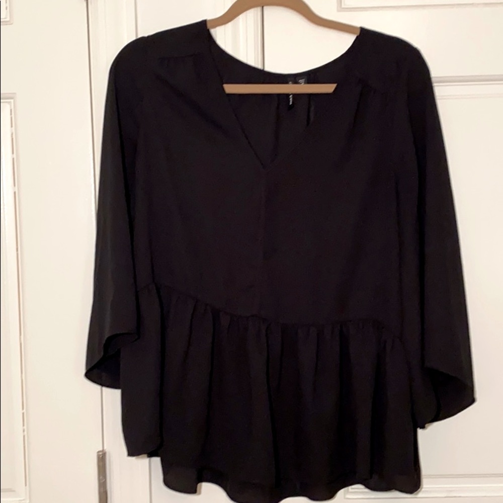 Black going out top